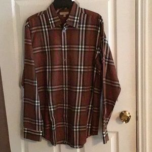 Burberry long sleeves polo shirt in large size.